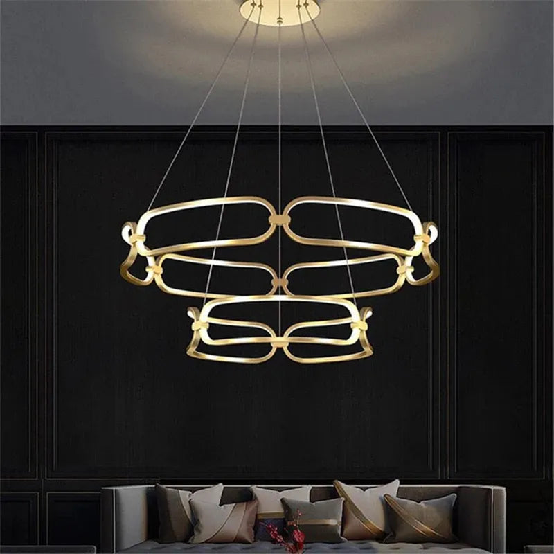 Moderner Luxus-LED-Decken-Kronleuchter "Golden Rings" – Metallgold mit kreisförmigen LED-Lichtelementen für exklusive Wohnraumdekoration - Unique Outlet